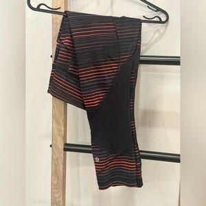 Lululemon Fast and free black/orange/blue striped Leggings 6